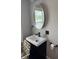 Bathroom vanity with matte black faucet and hardware at 1006 Hurricane St, Franklin, IN 46131