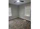 Bedroom with neutral paint, new carpet and natural light from two windows with blinds at 1006 Hurricane St, Franklin, IN 46131