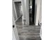 Hallway with hardwood floors and white trim throughout the home at 1006 Hurricane St, Franklin, IN 46131