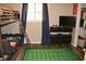 Bright room with bunk beds, football field rug, and dark blue curtains at 103 Bentwood Dr, Greenwood, IN 46143