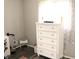 Bedroom featuring a white dresser, stool, and small decorations at 103 Bentwood Dr, Greenwood, IN 46143