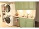 A kitchen featuring a state of the art stacked washer and dryer set at 103 Bentwood Dr, Greenwood, IN 46143