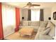 Spacious living room offers ample seating and natural light with decorative curtains at 103 Bentwood Dr, Greenwood, IN 46143