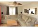 Comfortable living room featuring a large sectional sofa, stylish decor, and natural light at 103 Bentwood Dr, Greenwood, IN 46143