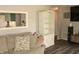 Cozy living room featuring a comfortable sofa and a white bookshelf for storage at 103 Bentwood Dr, Greenwood, IN 46143