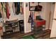 Organized storage closet featuring clothing rack, shoe rack and shelves at 103 Bentwood Dr, Greenwood, IN 46143