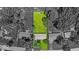 Aerial shot displays the property's well-defined lot boundaries and landscaping at 108 Bennett Rd, Carmel, IN 46032