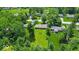 Lush greenery surrounds the property, creating a serene and private backyard oasis at 108 Bennett Rd, Carmel, IN 46032