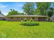 Expansive backyard with lush lawn, perfect for outdoor activities at 108 Bennett Rd, Carmel, IN 46032