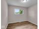 Charming bedroom with wood flooring and natural light at 108 Bennett Rd, Carmel, IN 46032