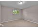Bedroom featuring new carpet and natural light at 108 Bennett Rd, Carmel, IN 46032