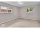 Bright bedroom with large windows offering pleasant outdoor views at 108 Bennett Rd, Carmel, IN 46032