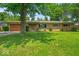 Charming single-story home with well-maintained front yard and attached garage at 108 Bennett Rd, Carmel, IN 46032