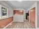 Cozy kitchen features modern flooring, an efficient layout and plenty of natural light at 108 Bennett Rd, Carmel, IN 46032