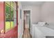 Functional laundry room featuring a window view to the outdoors at 108 Bennett Rd, Carmel, IN 46032