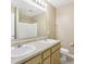 Well-lit bathroom featuring a double sink and ample counter space at 1138 Topp Creek Dr, Indianapolis, IN 46214