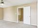 Bedroom featuring neutral walls, carpet, a ceiling fan, and a walk in closet at 1138 Topp Creek Dr, Indianapolis, IN 46214