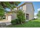 A two-story home with a well-manicured lawn, and an attached garage at 1138 Topp Creek Dr, Indianapolis, IN 46214