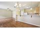 Open floor plan features a breakfast bar and seamlessly connects the living space to the kitchen at 1138 Topp Creek Dr, Indianapolis, IN 46214