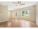 Open floor plan with a sliding glass door and windows provides ample natural light at 1138 Topp Creek Dr, Indianapolis, IN 46214
