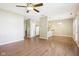 Open floor plan features a dining area, wood floors, and natural light at 1138 Topp Creek Dr, Indianapolis, IN 46214