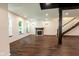 Spacious basement featuring modern fireplace, abundant natural light through multiple windows, and stylish flooring at 1210 Churchman Ave, Indianapolis, IN 46203