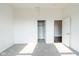 Bright bedroom with plush carpet and access to walk-in closet and adjoining room at 1210 Churchman Ave, Indianapolis, IN 46203