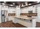 Modern kitchen with stainless steel appliances, granite countertops and a kitchen island at 1210 Churchman Ave, Indianapolis, IN 46203