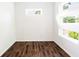 Office featuring natural light from the windows, and dark wood floors at 1210 Churchman Ave, Indianapolis, IN 46203