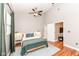 Bedroom with a ceiling fan and a view into the doorway at 1221 Cottage Ave, Indianapolis, IN 46203
