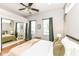Bright bedroom with large mirrored closet and modern ceiling fan at 1221 Cottage Ave, Indianapolis, IN 46203