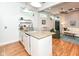 View of the open layout kitchen with granite countertops at 1221 Cottage Ave, Indianapolis, IN 46203