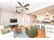 Open concept living area featuring a modern kitchen with stainless steel appliances at 1221 Cottage Ave, Indianapolis, IN 46203
