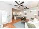 Open-concept living space with a modern kitchen and a seating area at 1221 Cottage Ave, Indianapolis, IN 46203