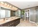 Primary bath with double sink vanity, and open closet space at 1314 Old Heritage Pl, Greenwood, IN 46143