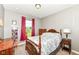 Bedroom with an inviting bed, carpet floor and natural light at 1314 Old Heritage Pl, Greenwood, IN 46143