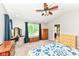 Bright bedroom with a ceiling fan, carpet floors, and lots of natural light at 1314 Old Heritage Pl, Greenwood, IN 46143
