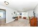 Versatile bonus room with ample natural light, carpet flooring, and space for multiple work areas at 1314 Old Heritage Pl, Greenwood, IN 46143