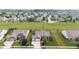 This aerial view showcases the neighborhood's manicured green spaces and perfectly lined properties and streets at 13327 Hockley Dr, Fishers, IN 46037