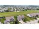 A beautiful aerial view showing a well-planned suburban neighborhood with green spaces and manicured lawns at 13327 Hockley Dr, Fishers, IN 46037