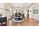 Elegant dining room with a chandelier, hardwood floors, and decorative accents, perfect for gatherings at 13327 Hockley Dr, Fishers, IN 46037