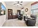 Spacious living room boasts plush seating, built-in bookshelves, and abundant natural light, creating a relaxing atmosphere at 13327 Hockley Dr, Fishers, IN 46037