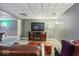 Finished basement featuring comfortable seating and entertainment center at 14301 W County Road 300 S, Daleville, IN 47334