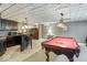 Finished basement with a billiards table and wet bar, perfect for recreation at 14301 W County Road 300 S, Daleville, IN 47334