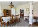 A dining room with hardwood chairs, an antique hutch, and a lace tablecloth-covered table at 14301 W County Road 300 S, Daleville, IN 47334