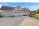 Beautiful home with a three-car garage, well-manicured lawn and landscaping at 14301 W County Road 300 S, Daleville, IN 47334