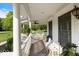 Charming front porch showcasing plenty of seating and an open feel with nice exterior views at 14301 W County Road 300 S, Daleville, IN 47334