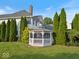 Charming gazebo nestled among mature trees, offering a serene outdoor space at 14301 W County Road 300 S, Daleville, IN 47334
