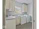 Efficient laundry room with modern appliances and ample storage space at 14301 W County Road 300 S, Daleville, IN 47334