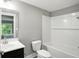 Updated bathroom with a tub/shower combo, sleek vanity and neutral paint at 14474 Treasure Creek Ln, Fishers, IN 46038